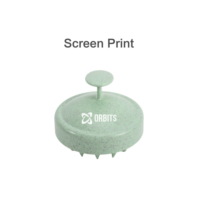 A green hair scalp massager with a round design and a centre handle, featuring a logo on the front.