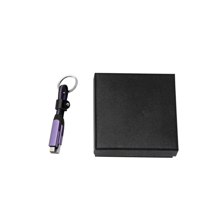 A braided charging cable in purple with a keyring attached, accompanied by a black gift box.