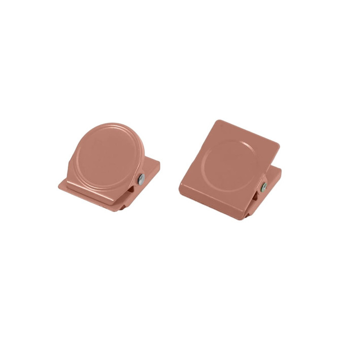 Two metal magnetic clips in a soft rose colour, featuring a round and a square design, each with a small logo.