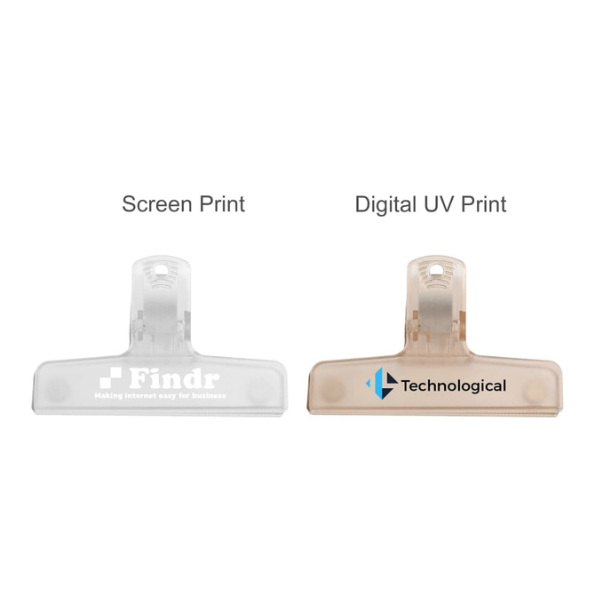 Translucent plastic magnetic clips in clear and light brown colours, featuring different printed designs on each.