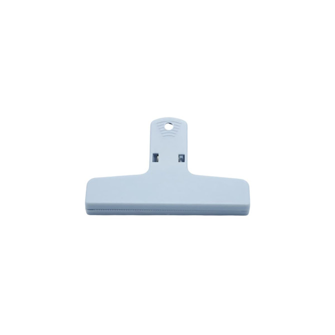 Light blue plastic magnetic clip with a flat design and a hanging hole at the top. Features a logo on the surface.