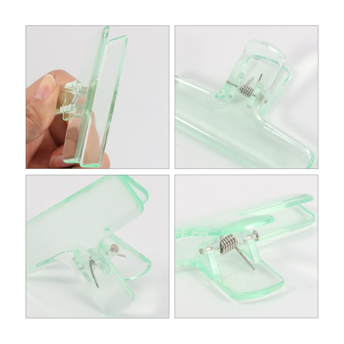 Translucent green plastic clips with a metallic spring mechanism, displayed from multiple angles.