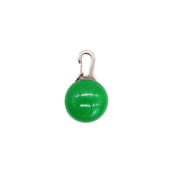 A green LED light with a metal clip, designed for dog walking.