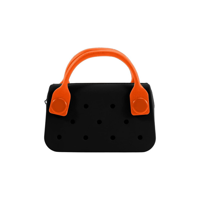 A mini handbag in black with orange handles and decorative holes on the front. It features a logo.