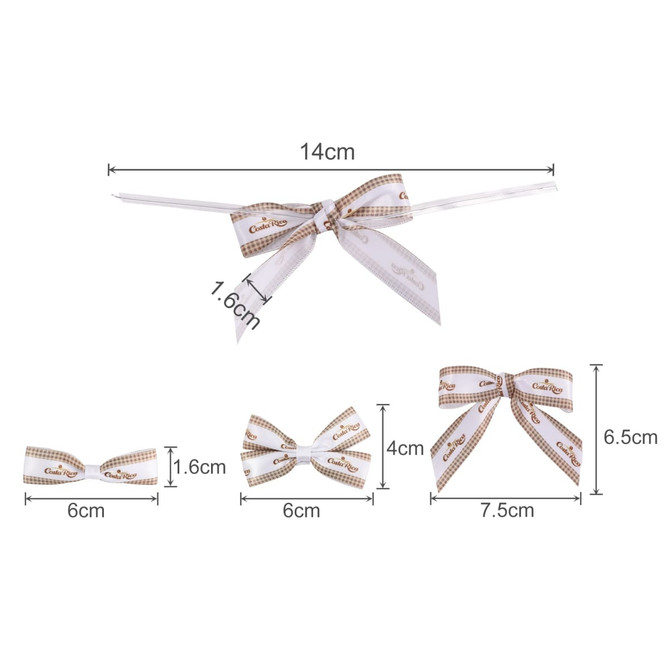 A set of decorative bows in white and gold, featuring various sizes and a ribbon tie for fastening.