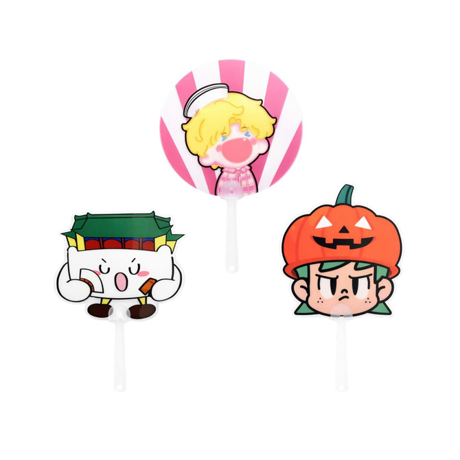 Three custom-shaped transparent PVC hand fans in vibrant colours featuring cartoon characters with different expressions.