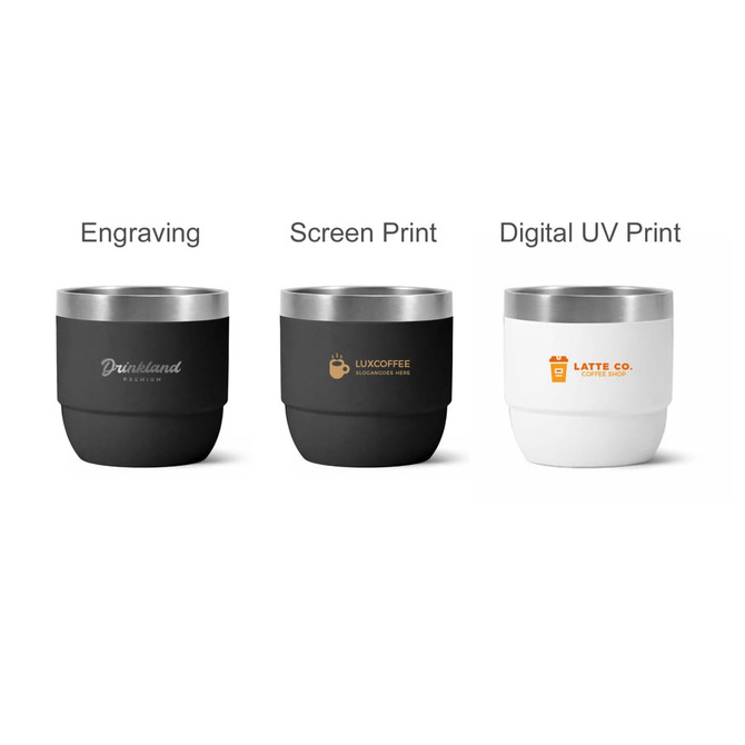 Three stackable stainless steel tumblers in black and white, featuring different logos and prints.