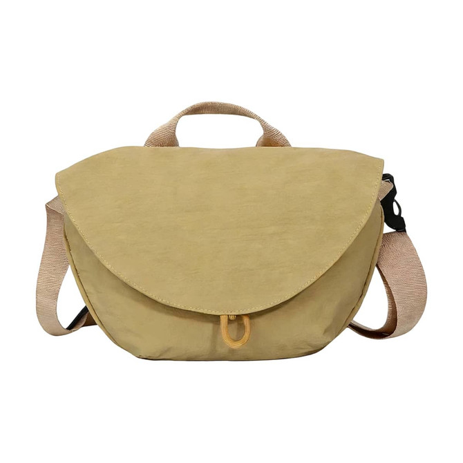 A casual crossbody bag in a soft yellow shade, featuring a flap closure and adjustable strap. It has a logo.