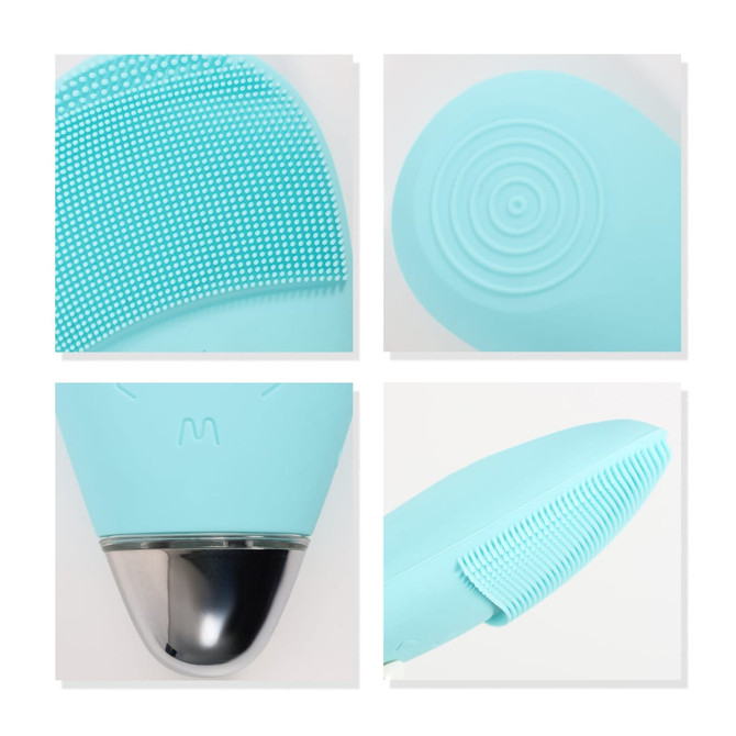 A silicone facial cleansing brush in light blue, featuring textured surfaces and a sleek metallic base.