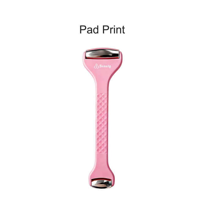 A double-headed ice massager roller in pink with a textured handle and a silver accent. It features a logo.