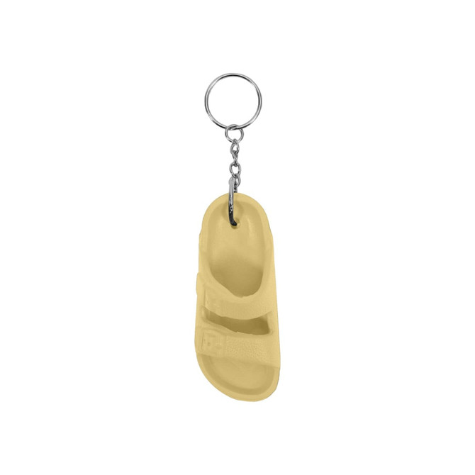 A yellow slides-shaped keyring with a silver keychain attachment.