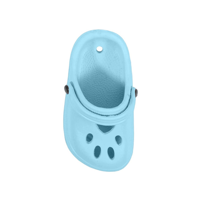 A light blue paw-shaped clog shoe fridge magnet with ventilation holes and a black button detail.