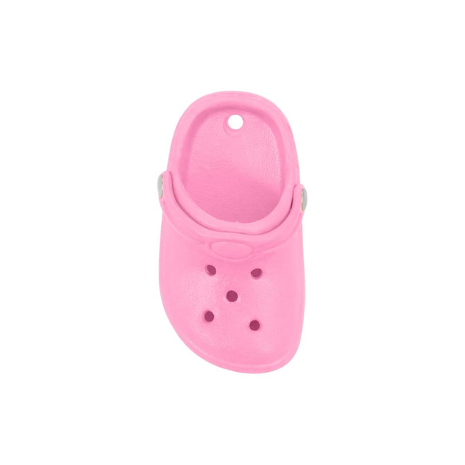 A pink clog shoe fridge magnet features a classic design with ventilation holes and a back strap.