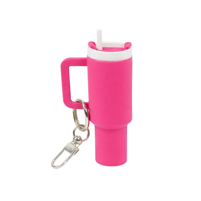 A pink mini tumbler keyring with a straw and a keychain attachment. Features a handle and a logo.