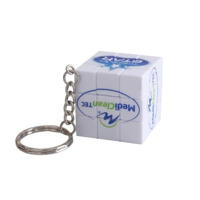 A small white twist cube keyring with a silver chain, featuring logos on its sides.