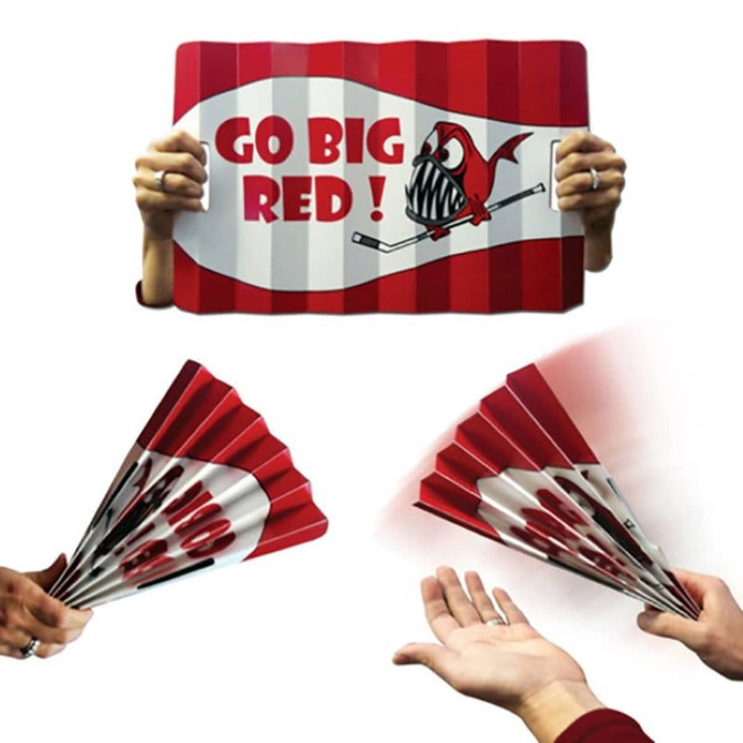 A pair of cardboard clappers in red and white, featuring a design with a fish and the phrase "Go Big Red!"