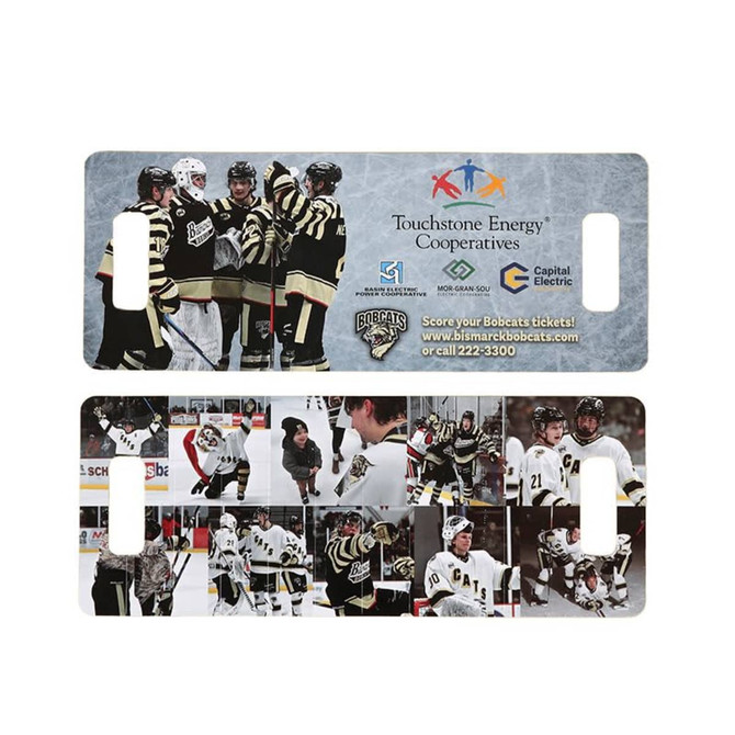 A promotional cardboard clapper featuring images of hockey players in black and gold uniforms, with a logo on the design.