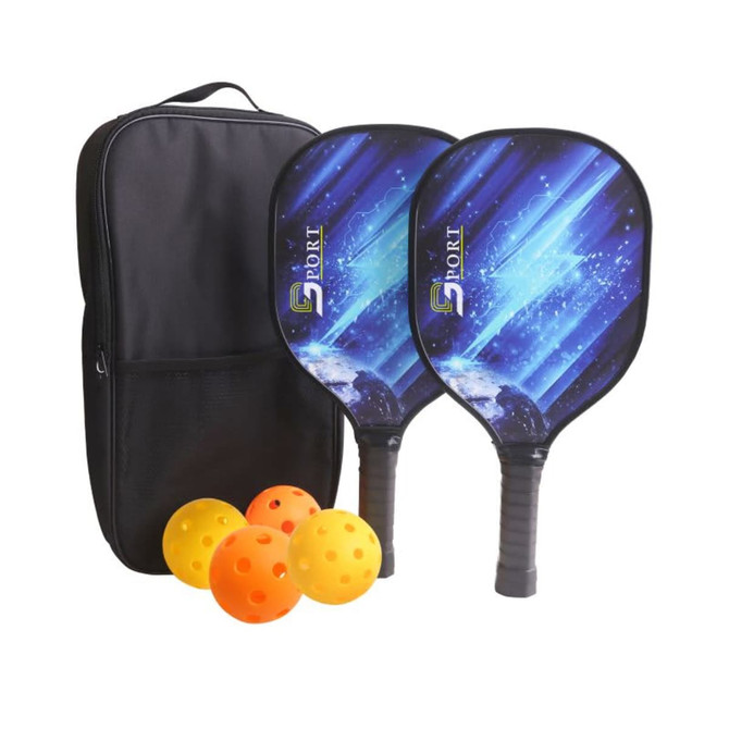 A wooden pickleball set featuring two paddles with a cosmic design, three yellow-orange balls, and a black carrying bag.