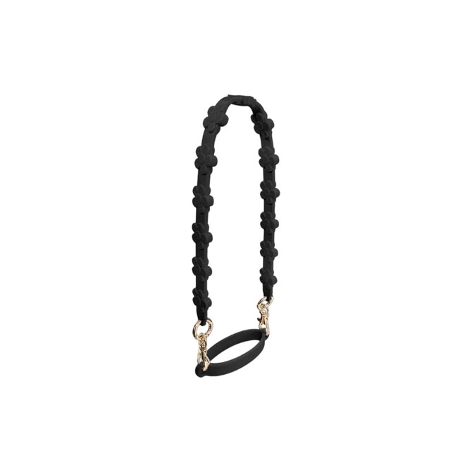 A drink bottle strap in black silicone with flower details and gold clips. Suitable for carrying tumblers easily.