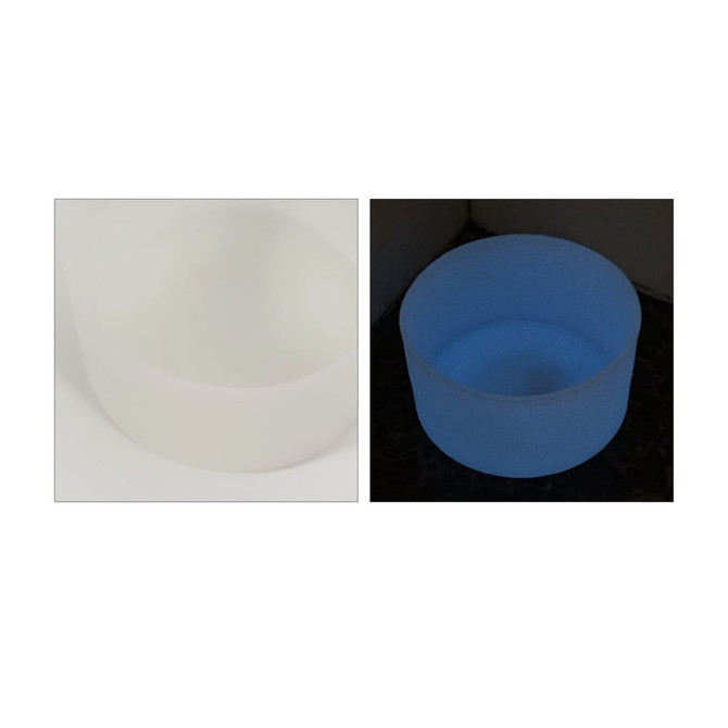 A glow-in-the-dark silicone boot for tumbler, displayed in white and glowing blue in the dark. Features a logo.