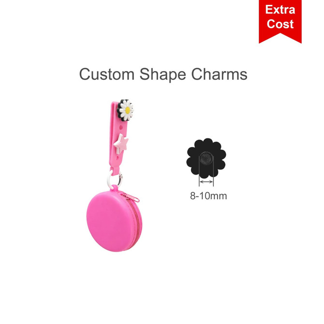 A silicone pouch in pink with a decorative strap featuring custom shape charms and a logo.