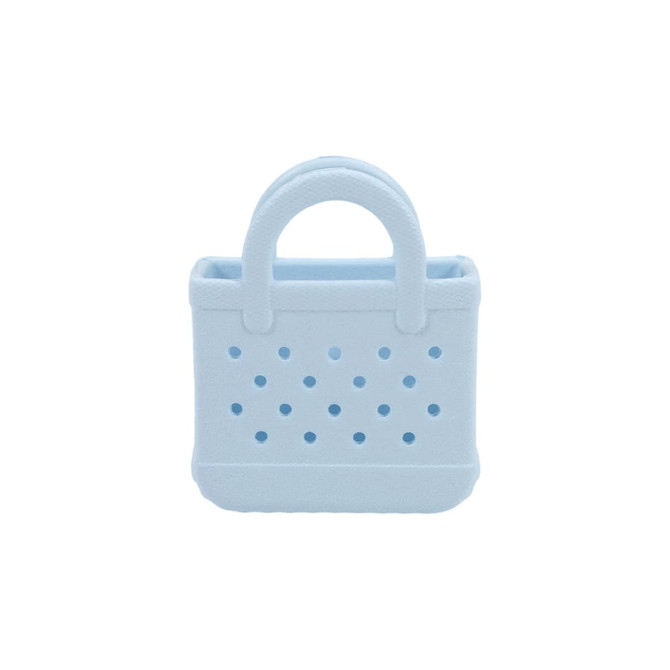 A light blue mini EVA bag charm with perforated design and two handles, featuring a logo.