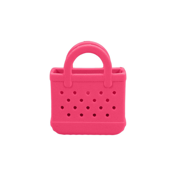 A small pink bag charm with holes and handles, made from EVA material. It features a textured surface and a branding logo.