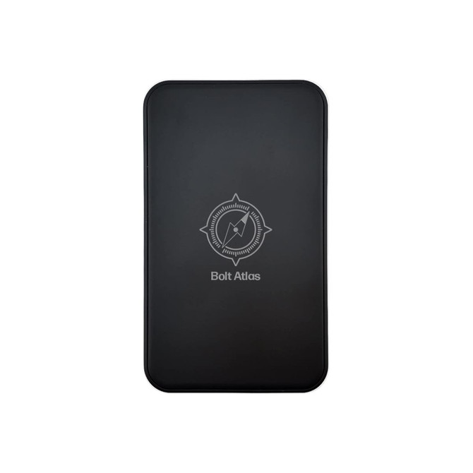 A black power bank featuring a compass design and a logo, with a sleek, smooth surface.