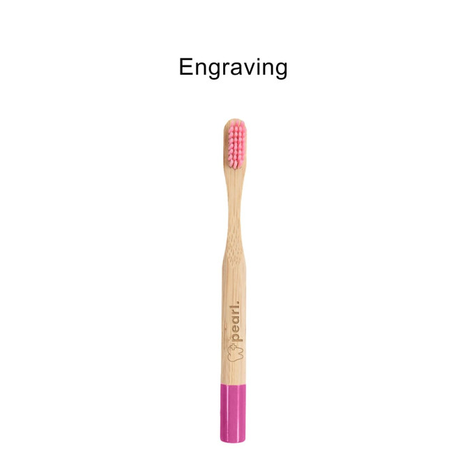 A bamboo toothbrush with a small round handle, featuring a pink brushing head and a logo.