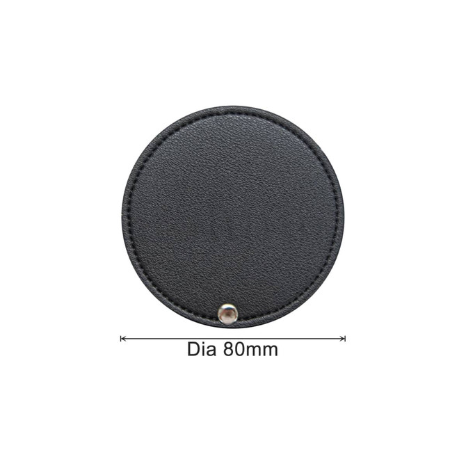 A round black makeup mirror with a diameter of 80mm, featuring a sleek leather-like texture.