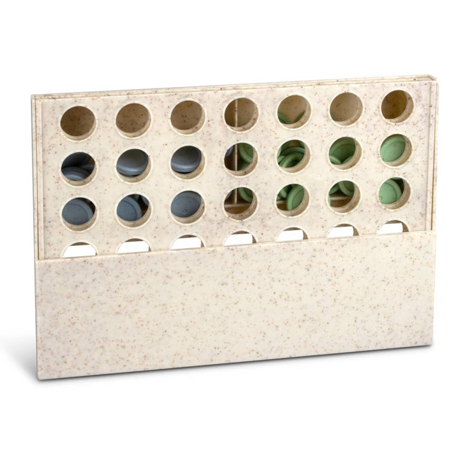 A Four in a Row game in a cream-coloured frame with multiple holes for game pieces.