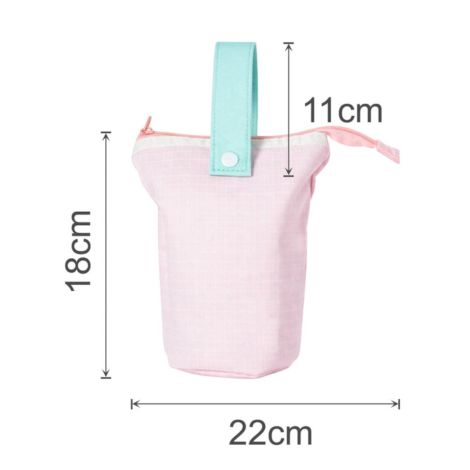 A foldable pencil case in pink with a mint green handle, featuring dimensions of 22cm x 18cm x 11cm.