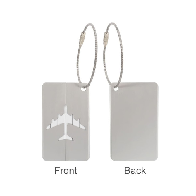 A silver luggage tag with an airplane design on one side and a plain back, featuring a wire cable attachment.