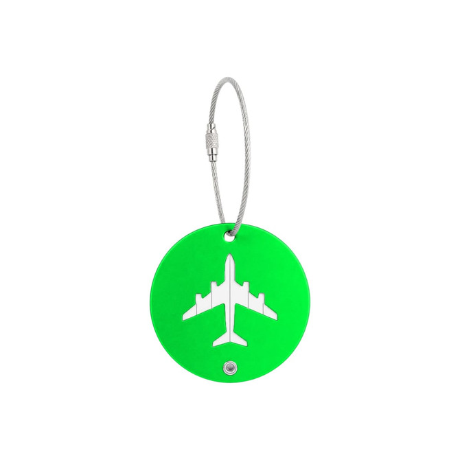 A green, round luggage tag with a silver wire and an airplane design cutout on it. It features a logo.