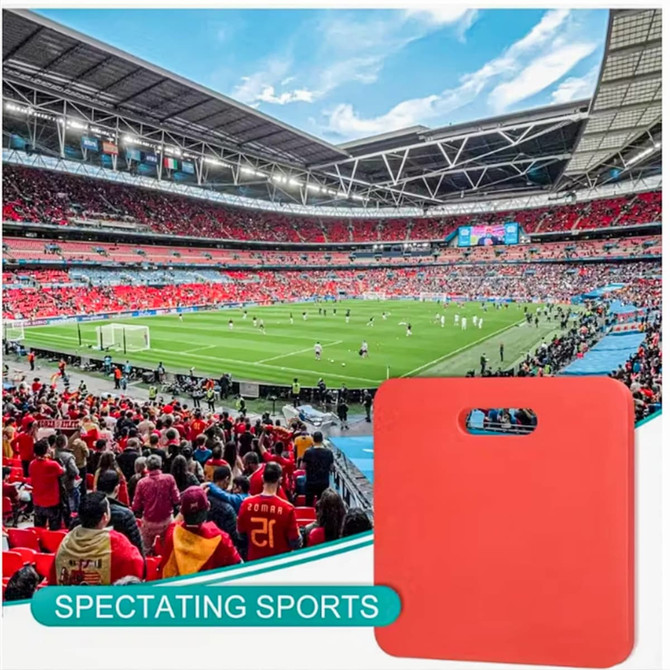 A red promotional stadium seat cushion with a handle, set against a vibrant sports stadium backdrop.