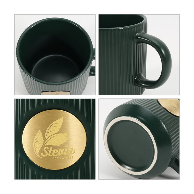 A green ceramic mug with a ribbed texture and a bronze medal at the front. It has a sturdy handle and an inner finish.