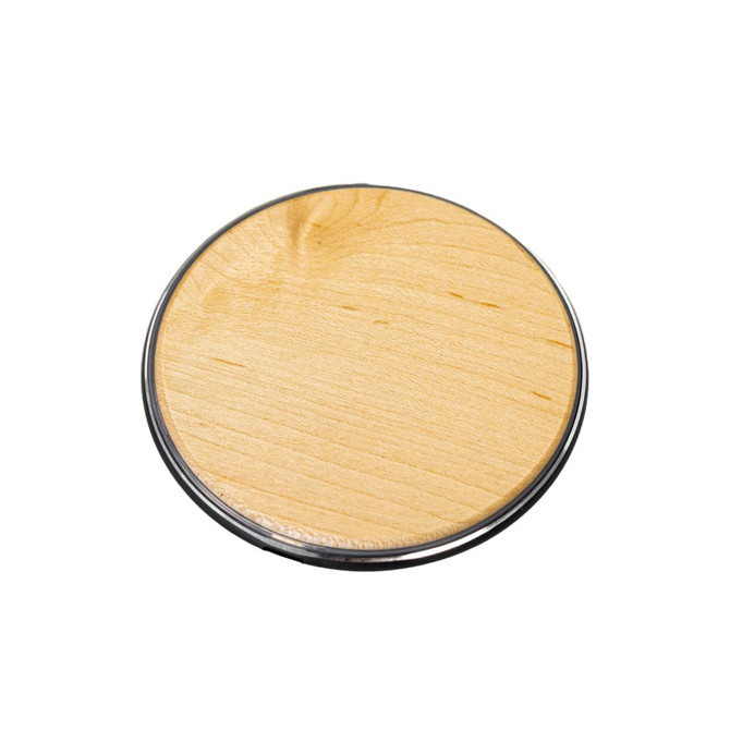 A circular bamboo wireless charger with a natural wood finish and a black base.