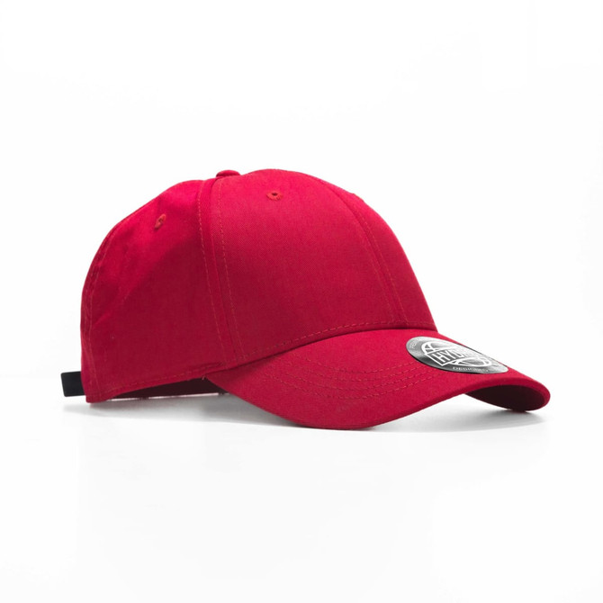 A red cap with a curved brim and a round logo on the front, positioned at an angle.