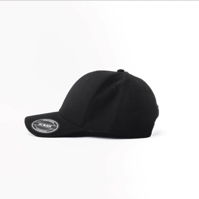 A black cap with a curved brim and a logo on the front.