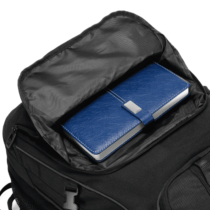 A black backpack with a partially open compartment revealing a blue notebook inside. The backpack features a logo.