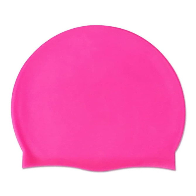 A bright pink silicone swimming cap with a simple design and a smooth surface.