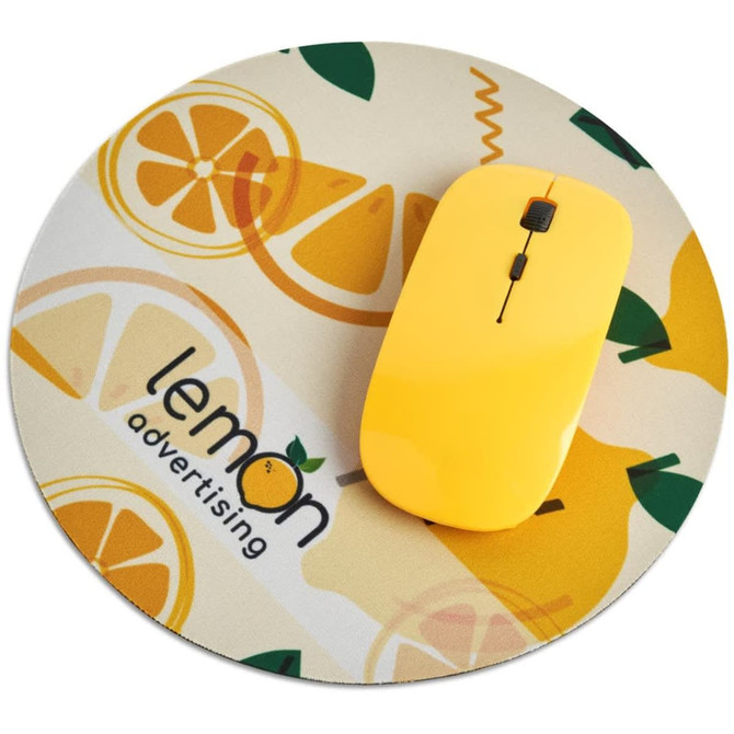 A round mouse pad in beige with lemon graphics and a yellow computer mouse on top. Features a logo.