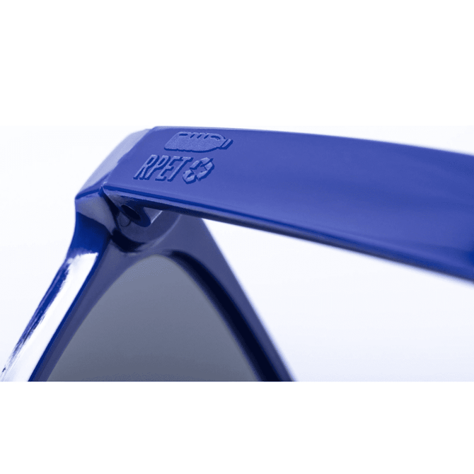 Blue sunglasses with dark lenses, featuring a logo on the temple and a smooth finish.
