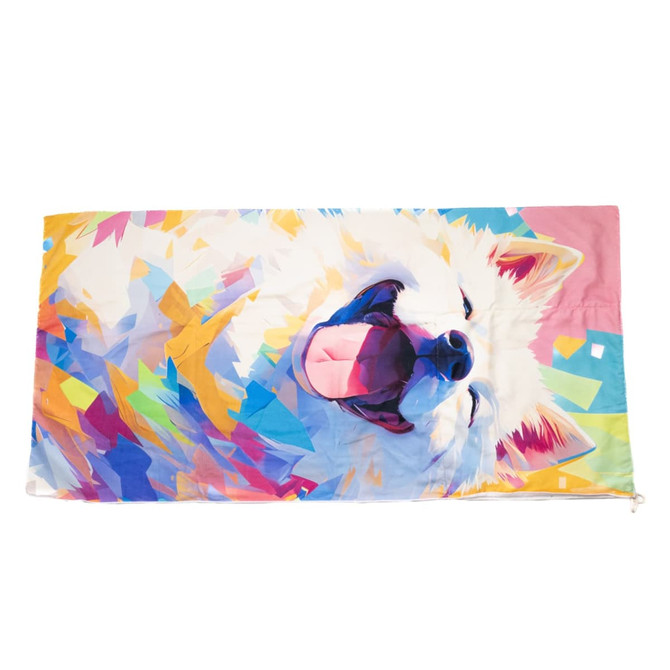 A colourful foldable drawstring towel featuring a happy dog design with vibrant geometric shapes in various colours.