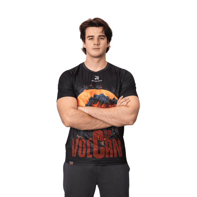 A black T-shirt featuring a vibrant graphic design with a volcanic scene and a logo on the chest.