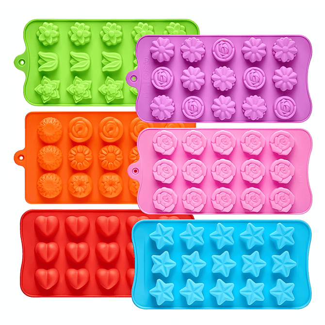 A collection of silicone ice trays in various colours, featuring custom moulds in shapes like flowers, hearts, and stars.