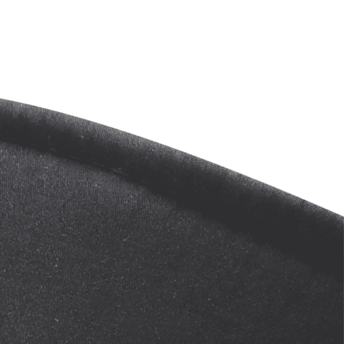 A black sun visor with a smooth curved edge and a fabric texture. It features a logo on the side.