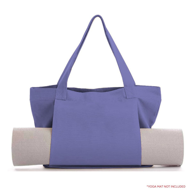 A lavender yoga mat canvas bag featuring sturdy handles, holding a rolled yoga mat. Includes a logo on the bag.