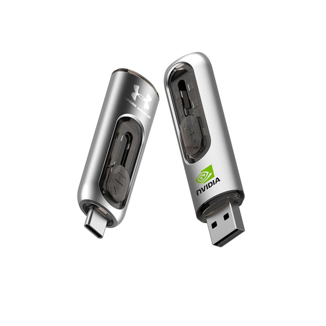 A silver 2 in 1 USB flash drive with a transparent casing and a logo. It has USB-C and USB-A connectors.