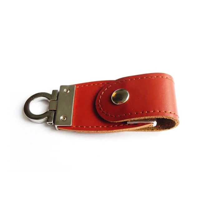 A red seal leather USB flash drive with a metallic clip and button detail. It features a simple, sleek design.